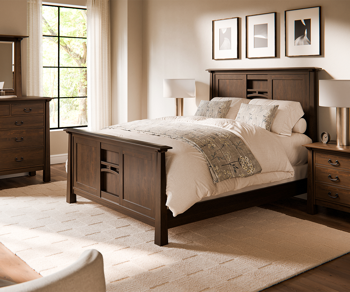 Elegant bedroom featuring solid wood furniture, including a Craftsman-style bed frame, matching nightstand, and a dresser with a mirror, set against dark paneled walls.