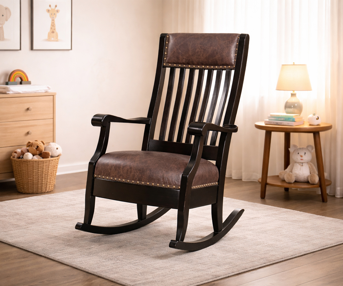 Dark wood rocking chair in a softly styled nursery