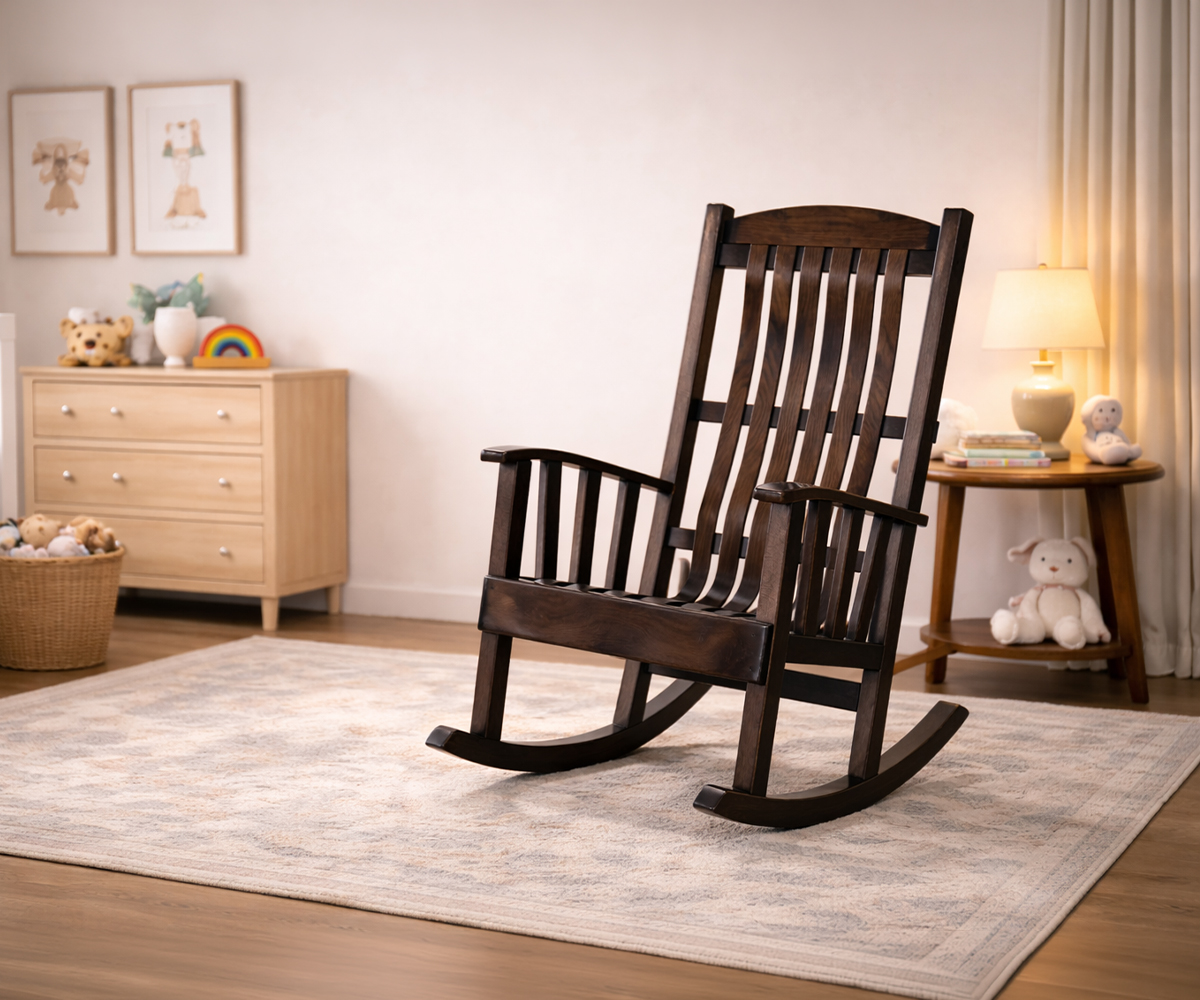 Glider vs rocker for nursery room with dark wood rocking chair on a soft area rug
