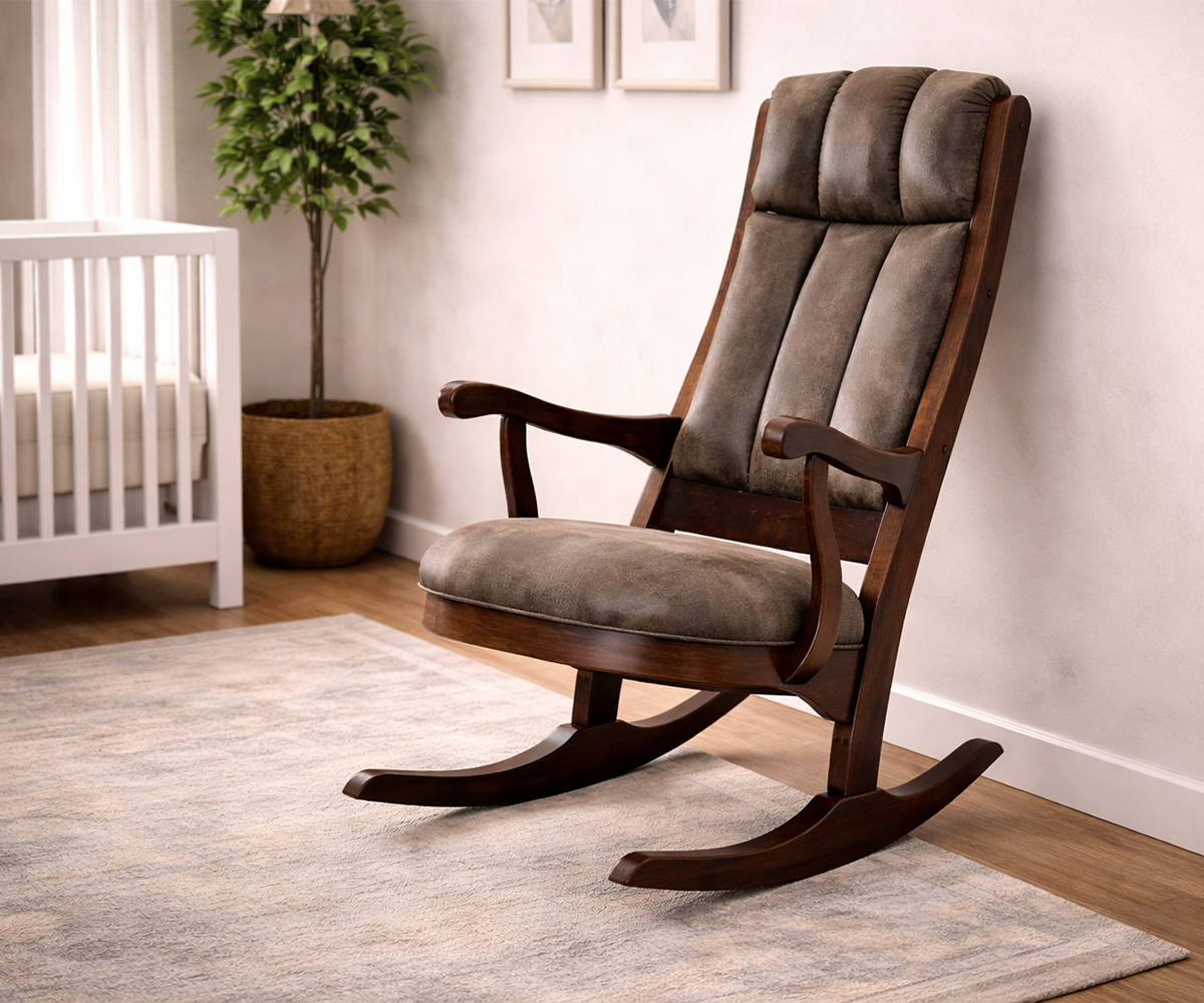 Padded nursery glider chair in a bright corner